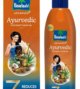 Parachute Advansed Ayurvedic coconut hair oil box and matching orange bottle with blue cap, showing a woman applying oil and coconut imagery and the claim '7 reduces seven early signs leading to hair fall' - Parachute Hair Oil Ayurvedic 180ml