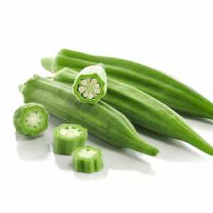 Fresh green okra pods with several round cross-sections showing the pale interior on a white background. - Okra (Bhindi) 500gm