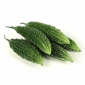 Three green bitter melons (bitter gourds) with a bumpy, ridged surface on a white background. - Karela 500gm