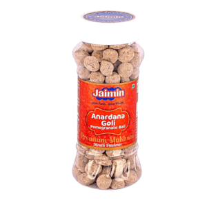 Clear plastic bottle of Jaimin Anardana Gol pomegranate ball mouth freshener with a red label and blue cap on top. - Jaimin Anardana Goli 175G
