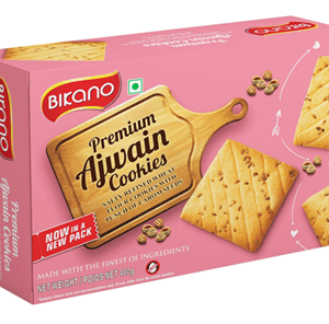 Pink Birano Premium Avain Cookies box with pictures of square biscuits on packaging on a pink background. - Bikano Ajwain Cookies 200 Gms