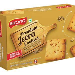 Gold BOX of Bikano Premium Jeera Cookies with a wooden cutting-board label and several jeera crackers displayed on the side. - Bikano Jeera Cookies 200 Gms