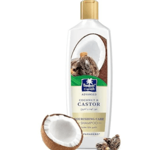 Bottle of Coconut & Castor Nourishing Care Shampoo with a halved coconut beside it and a gold cap - Parachute Adv Coconut & Castor Shampoo 340ml