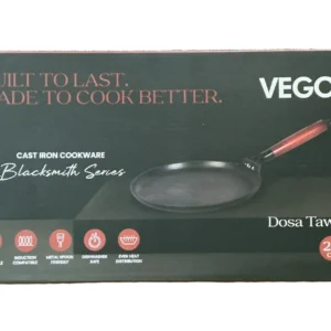 Boxed VEGO Blacksmith Series cast iron cookware with a skillet and red-handle pan visible on dark packaging, logo at top right. - Vego Cast Iron Dosa Tawa 28cm