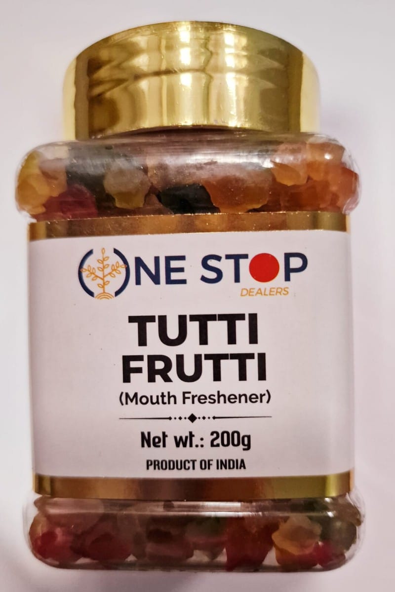 Jar of tutti frutti mouth freshener with a gold cap, brand 'One Stop Dealers', 200g, Product of India, visible mixed-color pieces inside. - One Stop Tutti Frutti 200Gm