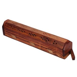 Long wooden carved instrument with multiple finger holes along the top and animal silhouettes on the sides. - Vego Wooden Aggarbatti stand 12″